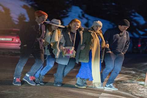 Sarah Ferguson walks arm in arm with Beatrice and Eugenie in Swiss ski resort as Prince Andrew..