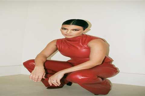 Kourtney Kardashian shows off natural short hair without extensions as she poses in red leather..