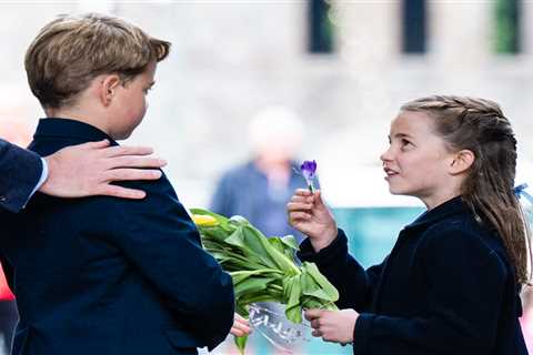 Royal fans touched by sweet moment Princess Charlotte gives big brother Prince George a flower on..