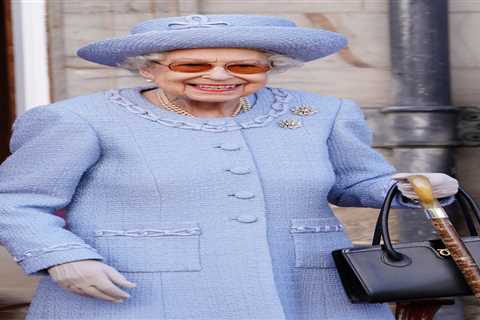 Queen, 96, beams in blue as she steps out with Prince Charles for military parade at Holyroodhouse