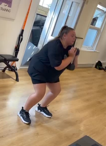 EastEnders star Clair Norris looks worlds away from Bernadette as she works up a sweat in the gym
