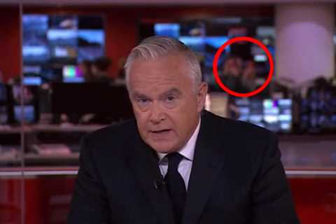 Watch shock moment BBC staffers take PHOTOS in background of Queen’s death announcement by..