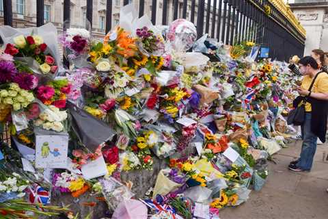 The ocean of flowers ­outside the palaces is the true measure of the Queen’s worldwide fame