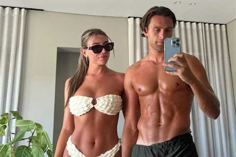 Love Island’s Casey O’Gorman shows off his ripped abs as he poses for snap with Rosie Seabrook..