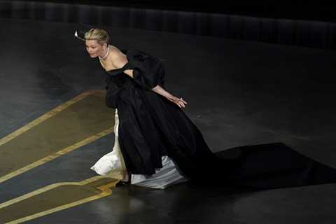 Elizabeth Banks suffers major Oscars blunder as she trips on-stage twice in embarrassing live TV..