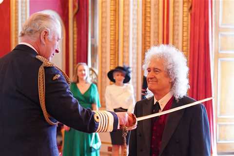 Queen guitarist Brian May knighted by King Charles at Buckingham Palace