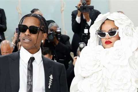 Rihanna Pays Homage to Karl Lagerfeld in a White Floral Valentino Cape Gown with A$AP Rocky in..