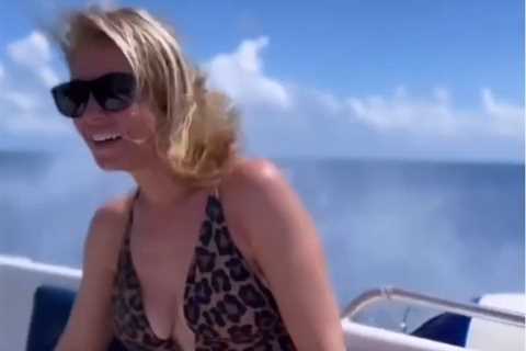 A Place in the Sun’s Laura Hamilton shows off figure in plunging swimsuit on sun-soaked holiday