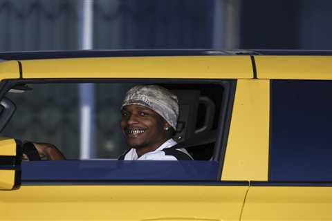 Rihanna’s baby daddy A$AP Rocky spotted flashing massive grin in first outing since singer..