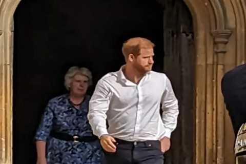 Prince Harry looked choked up after enduring a lonely vigil at the Queen’s final resting place at..