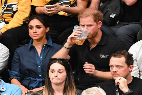 Prince Harry and Meghan Markle swig beer at Invictus volleyball final as they celebrate Duke’s 39th ..