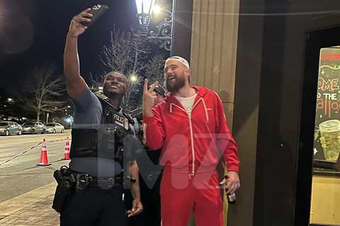 Travis Kelce Takes Photo at Restaurant with Cop After Kansas City Parade Shooting