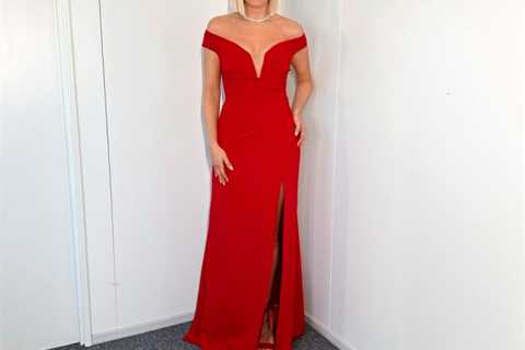Striking Holly Willoughby goes braless in plunging red dress for Dancing On Ice