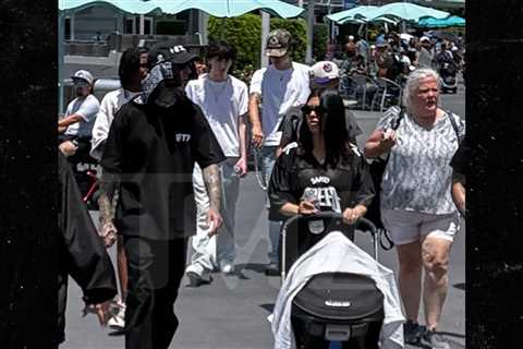 Kourtney Kardashian, Travis Barker Spend Father's Day at Disney World