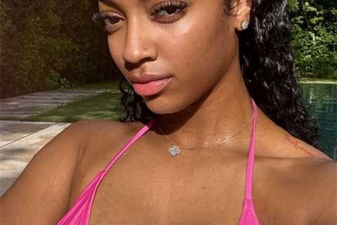 Angel Reese enjoys WNBA break in pink bikini in new photos