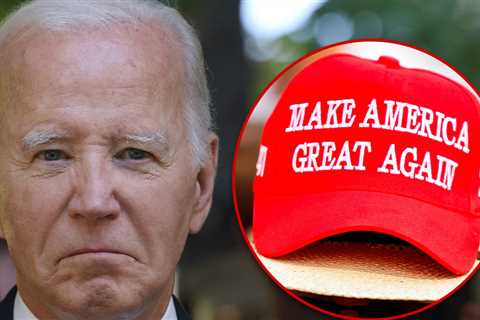 President Biden Wears Trump Hat For Unity, White House Says