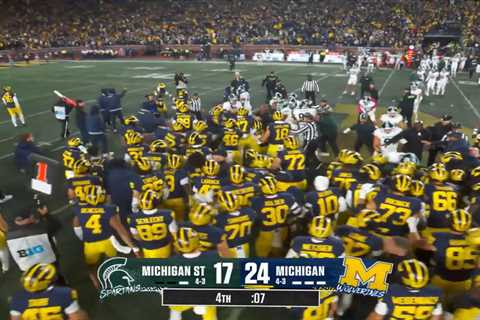 Punches thrown as Michigan, Michigan State sidelines clear in wild scene