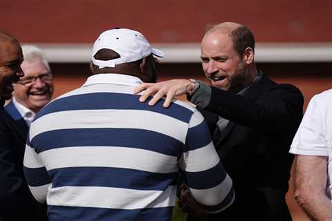 Prince William kicks off South Africa trip with touch rugby game