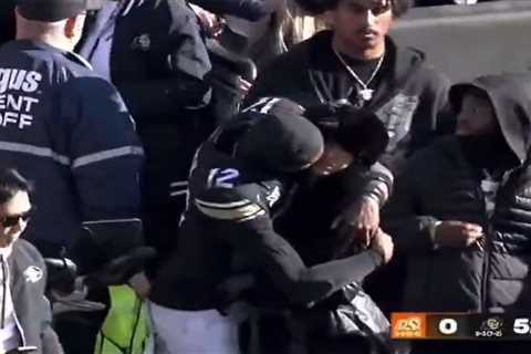 Travis Hunter, fiancée involved in awkward on-field exchange after Colorado win