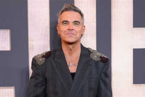 Robbie Williams Addresses Rumors About His Sexuality, Saying He ‘Wants to Be Gay,’ But Isn’t