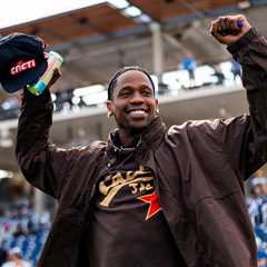 Travis Scott Throws First Pitch at Cacti Park for Astros Spring Training Opening Day