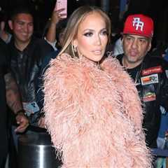 Jennifer Lopez Wore a Peach $835 “The New Arrival” Dress with a Feather Bolero and FEMME LA Heels..