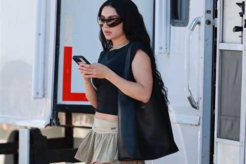 Charli XCX Trades in Trendy ‘Brat’ Green Style For This ‘It-Girl’ Coach Tote