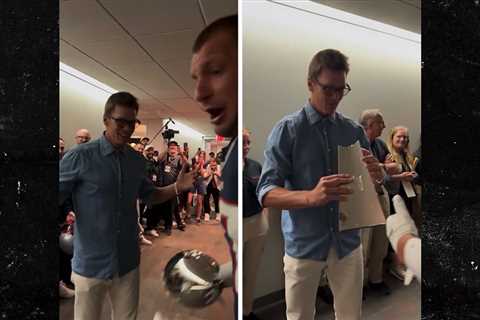 Tom Brady and Rob Gronkowski Break Lombardi Trophy at Fanatics Fest 2025