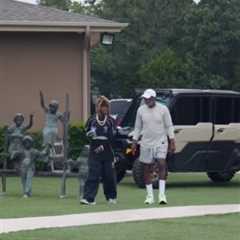 Deion Sanders makes rare appearance alongside Lil Wayne while battling mysterious health scare