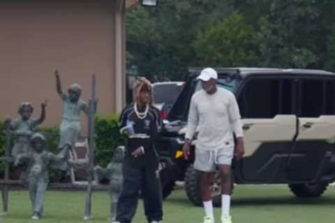 Deion Sanders makes rare appearance alongside Lil Wayne while battling mysterious health scare