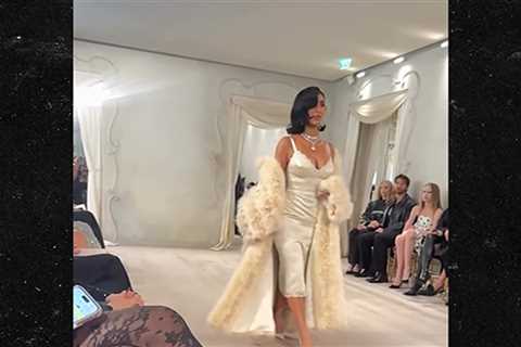 Kim Kardashian's Awkward Walk Down Balenciaga Runway, Caught on Camera