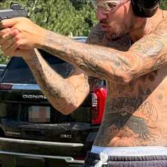 Justin Bieber Shooting Guns Shirtless
