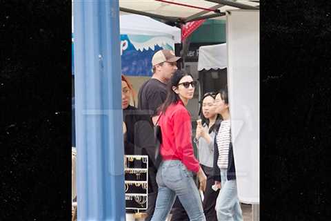 Armie Hammer Grabs Lunch, Walks Through Farmer's Market with Mystery Woman