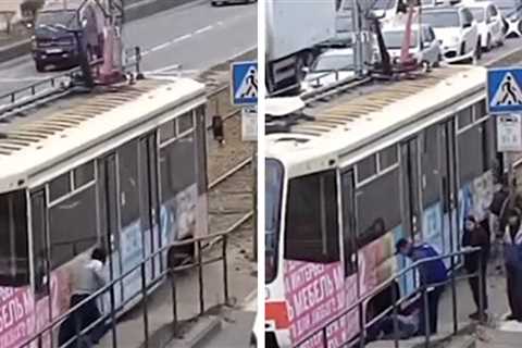 Man Trips, Falls Underneath Moving Train, Somehow Survives, on Video