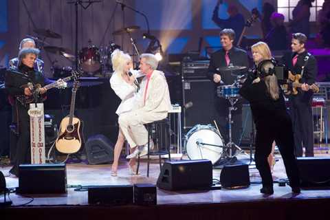 Watch Dolly Parton Sing to Porter Wagoner at the Grand Ole Opry From ‘Opry 100: Country’s Greatest..