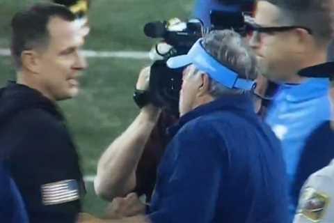 Bill Belichick brushes past Wake Forest coach with frosty handshake after UNC loss