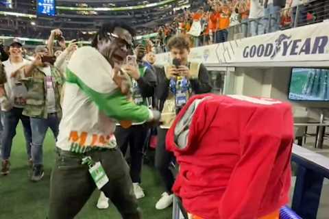 Michael Irvin had wild belt-whipping celebration after Miami stunned Ohio State