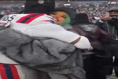 Cardi B in a Custom Gray Leather Sir Babajagne Look as She Congratulates Stefon Diggs After..