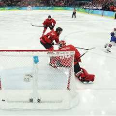 Listen to Kenny Albert’s electric NBC call of Jack Hughes’ overtime Olympic winner for Team USA