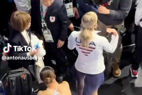 Amber Glenn shields crying figure skater from cameraman after crushing Olympic moment