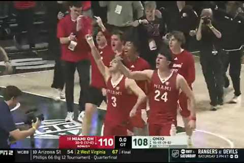 Miami (Ohio) players flip off fans as trash rains down in chaotic scene after securing undefeated..