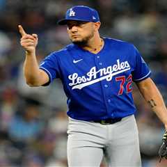 Miguel Rojas staying with Dodgers , who hope to get other stars back soon