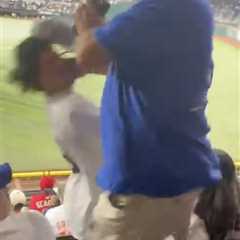 Taunting Yankees fan brutally beaten up by Rangers fans, girlfriend thrown down steps in wild scene