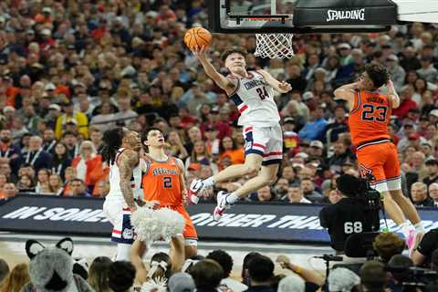 UConn holds off furious Illinois rally to make March Madness championship game return