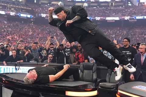 Jelly Roll Smashes Pat McAfee Through a Table at WrestleMania