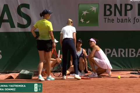 Turkish tennis player retires mid-match after tripping over ad prop in stunning French Open injury
