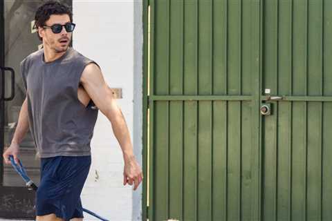 'Heated Rivalry' Star François Arnaud Shows Off Sculpted Arms On Dog Walk