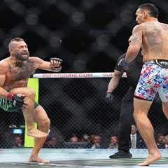 Conor McGregor injures leg just seconds into fight in quick loss to Max Holloway — and is heavily..