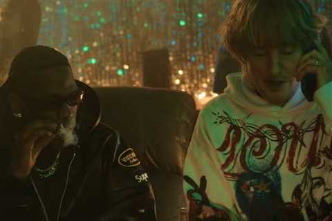 Watch Travis Scott & Sexyy Red Help Owen Wilson Search for His Son in Chaotic ‘Rolling Loud’..